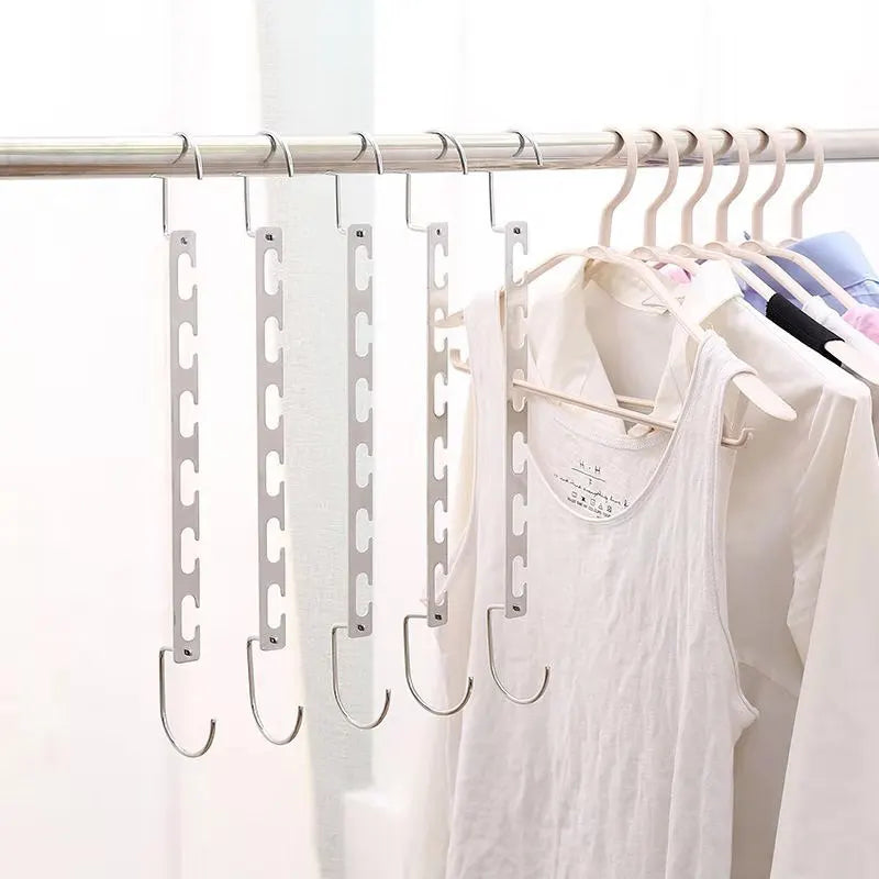 Maximize Closet Space with 6 Hole Clothes Hanger Organizer - Efficient Clothing Storage & Drying Rack