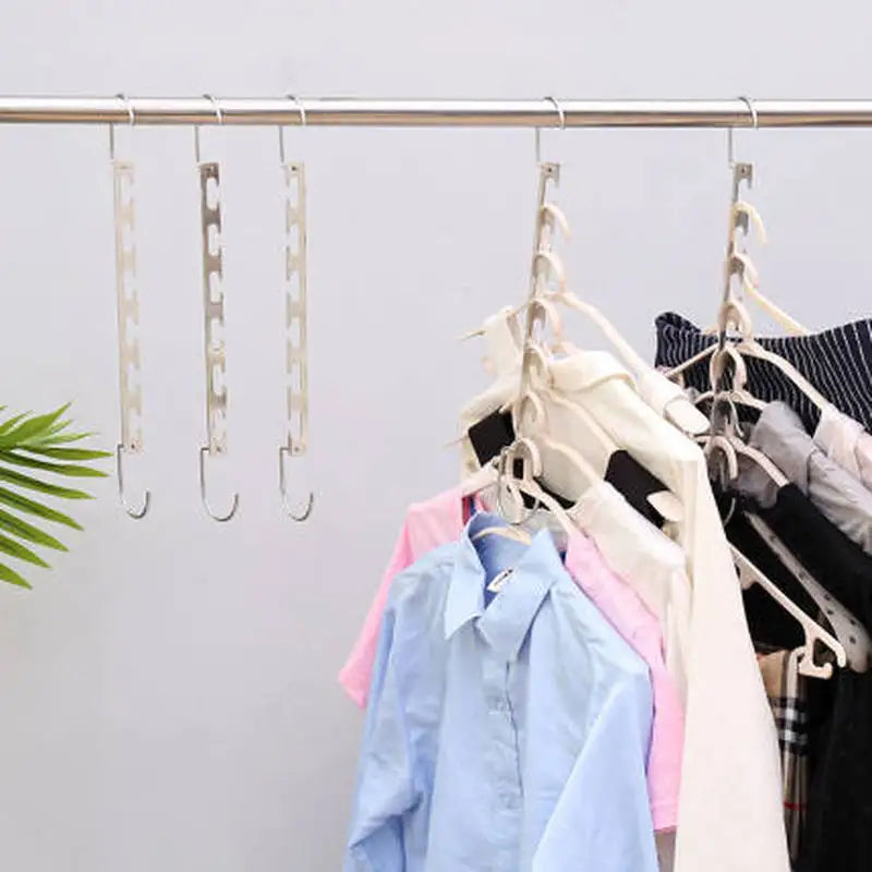 Maximize Closet Space with 6 Hole Clothes Hanger Organizer - Efficient Clothing Storage & Drying Rack